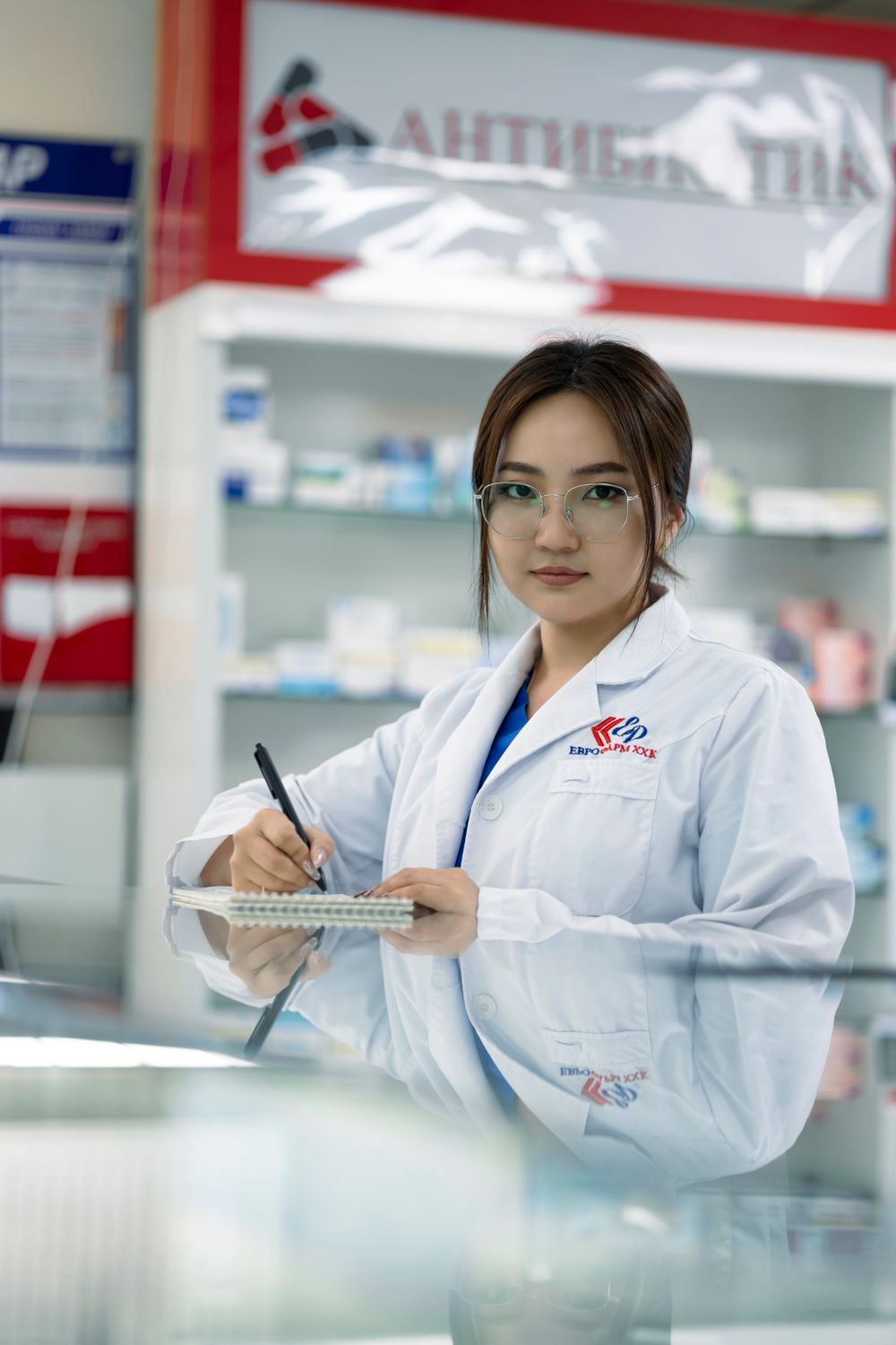 Pharmacist verifying a medication order